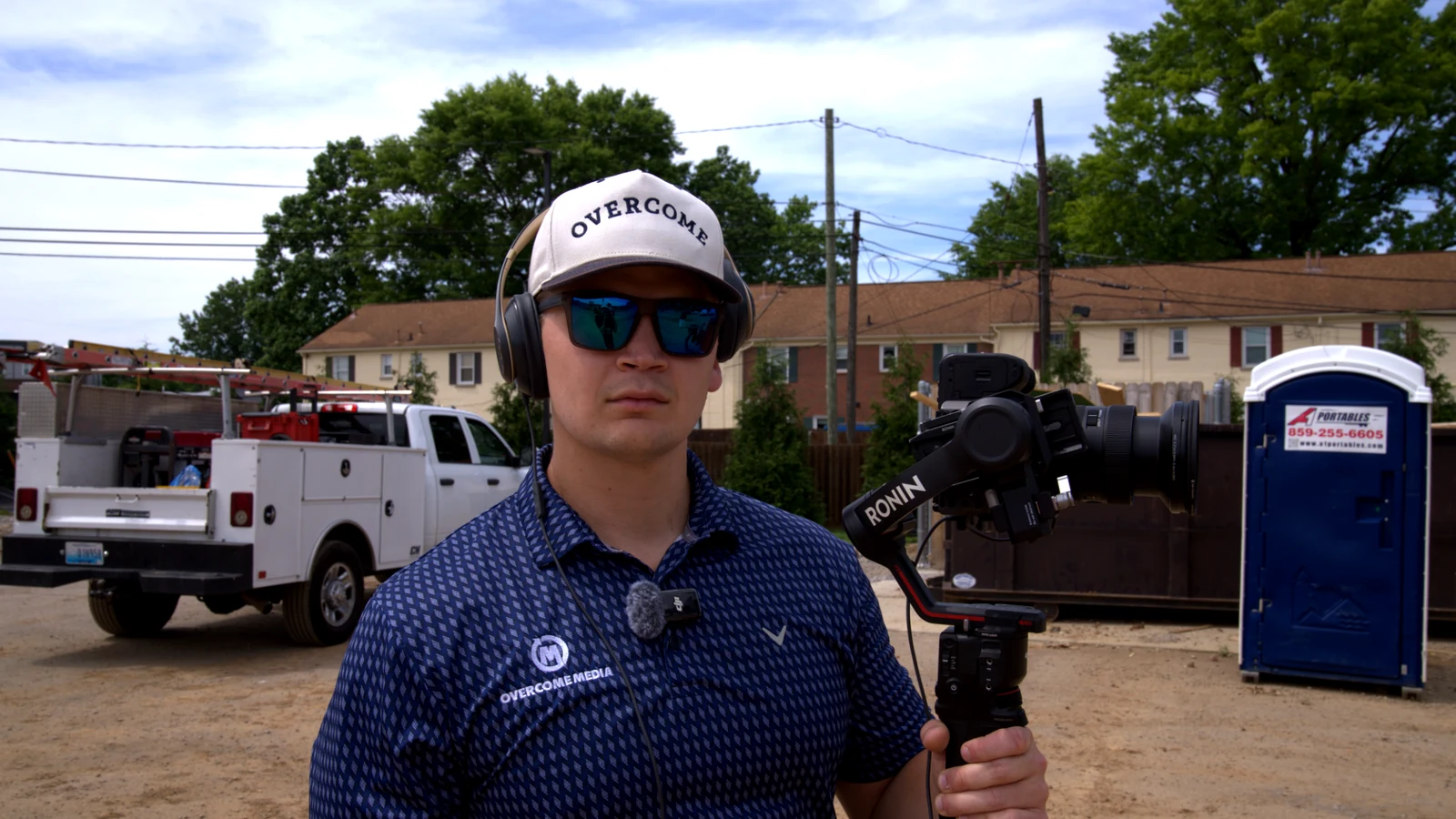 Overcome Media videographer working at a Lexington construction project